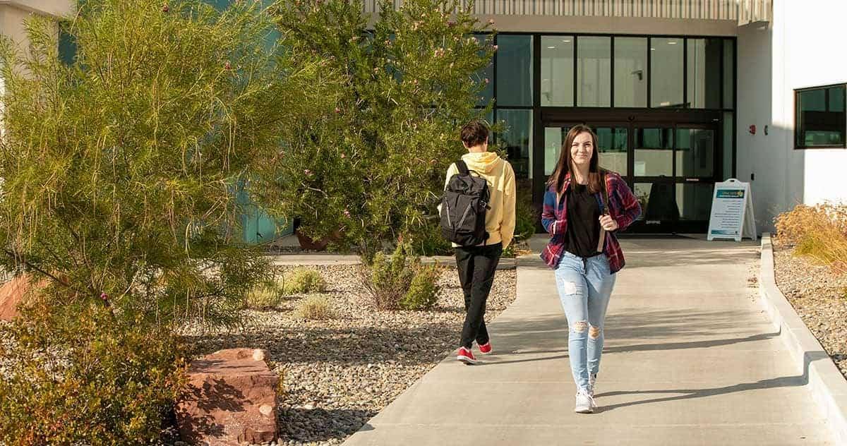 Student walking through campus